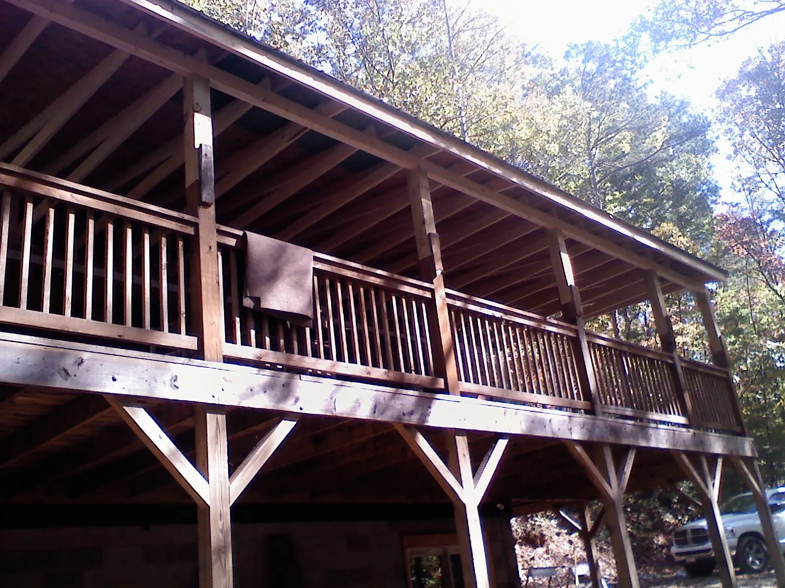 Timber framing under a new elevated porch and deck — Roof Leak Repair in Peru by Roofing Brothers